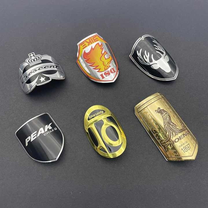 Custom manufacturer 3d metal bicycle motorcycle logo self adhesive metal embossed stickers